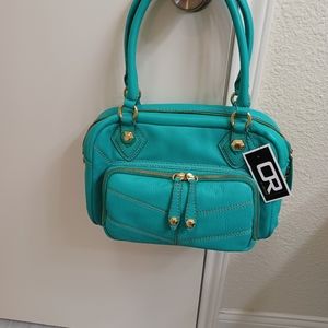 Clearing out closet of bags some still have tags.